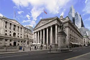 Tall Prints: Skyscrapers rise behind the Bank of England and the Royal Exchange in the City of London