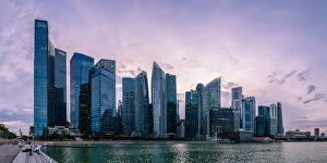 Skyscrapers Prints: Skyscrapes line Marina Bay at dusk, Singapore, Southeast Asia, Asia
