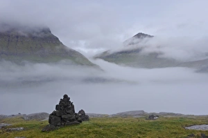Images Dated 1st September 2008: Slaettaratindur peak, highest point in Faroes at 882m, emerging from the mist