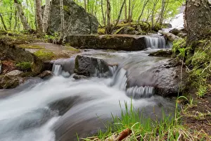 Long Prints: Slow motion exposure of a stream around the small town of Hellemobotn
