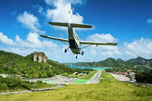 Small airplane landing at the airport of St. Barth (Saint Barthelemy), Lesser Antilles