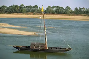 Loire Prints: Small boat moored on the River Loire near Mont Jean in Pays de la Loire, France, Europe