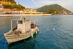 Fishing Prints: Small fishing boat in the Harbor of Parga, mainland Greece, Greece, Europe