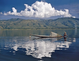 Small fishing boat on Inle Lake, Shan State, Myanmar (Burma), Asia Small fishing boat on Inle Lake, Shan State, Myanmar (Burma), Asia