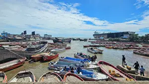 Small Prints: Small fishing boats gather at a shipwreck cemetery in Chittagong