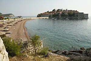 The small islet of Sveti Stefan, now an exclusive Aman hotel resort, Budva, Montenegro, Europe