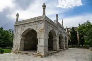 Retreat Prints: Small mosque in gardens surrounded by green trees in Kabul