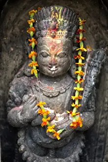 Paint Prints: Small shrine with blessing of colourful paint and offerings of food, Swayambhunath