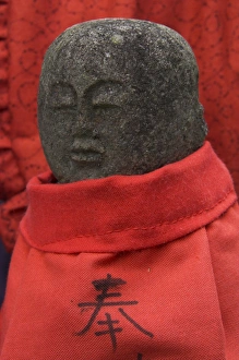 Ohara Prints: Small stone figure wearing traditional red dress