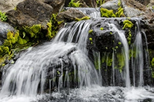 Kauai Prints: Small stream cascading over rocks in mountains of Kilauea
