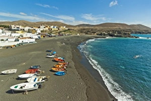 Images Dated 12th August 2010: Small west coast black sand beach resort, popular for its caves and cliff walk, Ajuy, Pajara