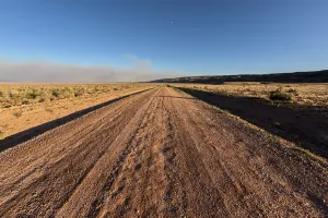 Dirt Prints: Smoke from the Dragon Bravo Wildfire burning on Grand Canyon North Rim billowing off the Kaibab Plateau
