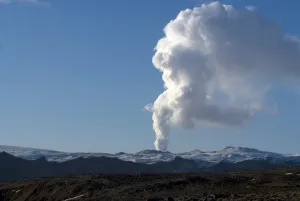 Eruption Prints: Smoke plume rising over glacier, Eyjafjallajokull volcano, Iceland, Polar Regions