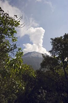 Smoke rises from the active crater of Tungurahua Volcano that threatens the nearby resort town of Banos