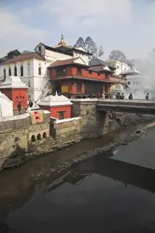 Bagmati Prints: Smoke rising from cremation ceremony on banks of Bagmati River during Shivaratri festival