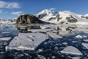 Ice Floe Prints: Snow-capped mountains in the Errera Channel on the western side of the Antarctic Peninsula