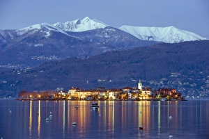 Snow capped mountains above Isola Superiore, Borromean Islands on Lake Maggiore Snow capped mountains above Isola Superiore, Borromean Islands on Lake Maggiore