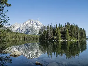 Grand Teton Prints: Snow-capped mountains reflected in the calm waters of Leigh Lake, Grand Teton National