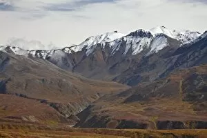 Snow-capped mountains and tundra in fall color, Denali National Park and Preserve