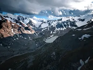 Breathtaking Views Prints: Snow-capped peaks and lush valleys at sunset showcased in a stunning landscape