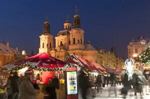 Images Dated 2nd December 2010: Snow-covered Christmas Market and Baroque St. Nicholas Church, Old Town Square, Prague
