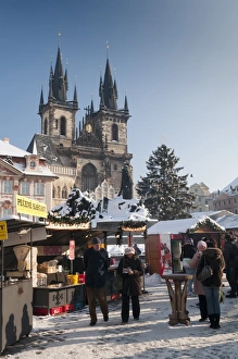 Images Dated 16th December 2010: Snow-covered Christmas Market and Tyn Church, Old Town Square, Prague, Czech Republic, Europe