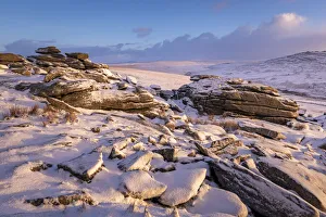 Snow covered granite outcrops on Great Staple Tor, Dartmoor National Park, Devon, England