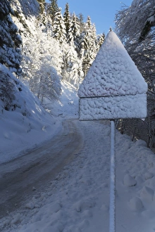 Covered Prints: Snow-covered road sign in the Italian Alps in winter, Aosta Valley, Italy, Europe