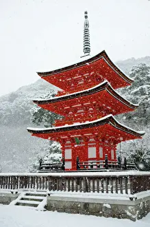 Fence Prints: Snow falling on small red pagoda, Kiyomizu-dera Temple, UNESCO World Heritage Site