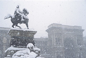 Snowing Prints: Snow falling on the statue of Vittorio Emanuele, Milan, Lombardy, Italy, Europe