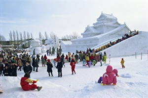 Snow sculpture and crowds during Snow Festival