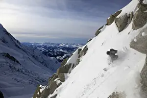 French Alps Prints: A snowboarder tackles a challenging off piste descent on Mont Blanc, Chamonix