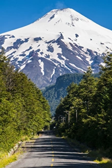 Southern Chile Prints: Snowcapped volcano Villarrica towering above Pucon, southern Chile, South America