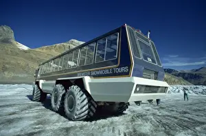 Rockie Prints: Snowmobile that takes tourists onto the Athabasca Glacier in Jasper National Park in the Rocky Mountains in British