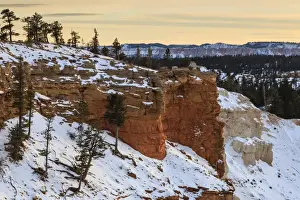 Hoodoo Prints: Snowy cliffs of the rim lit by weak winters late afternoon sun