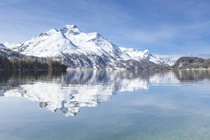 Lake Sils Prints: Snowy peaks reflected in the clear water of Lake Sils, Maloja, Canton of Graubunden