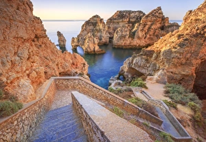 Lagos Prints: Soft colors of dawn on the red cliffs of Ponta Da Piedade, Lagos, Algarve, Portugal