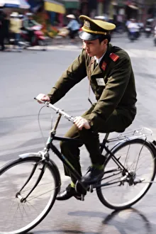 One Man Only Prints: Soldier on bicycle, Hanoi, Vietnam, Indochina, Southeast Asia, Asia