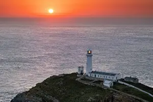 Warmth Prints: South Stack Lighthouse at sunset, Holy Island, Isle of Anglesey, North Wales, UK