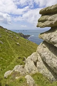 Images Dated 8th July 2008: Part of the South West Coast Path at Mayon cliff near Lands End showing the Longships lighthouse