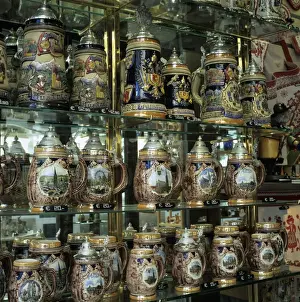 Austria Prints: Souvenir shop window display of traditional Austrian beer tankards