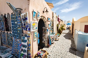 Magnet Prints: Souvenir shops selling pictures, magnets and jewellery in Oia, Santorini, Cyclades