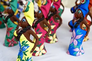 Objects Prints: Souvenir traditional Cuban lady statues for sale in craft market in Trinidad