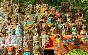 Artisan Prints: Souvenir wooden carved face masks on sale