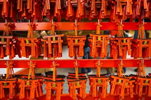 Hanging Prints: Souvenirs of the Endless Red Gates of Kyotos Fushimi Inari Shrine, Kyoto, Japan, Asia