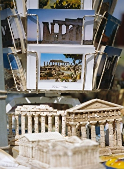 Stall Prints: Souvenirs including models of temples and postcards for sale