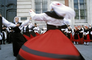 Spaniards in national dress performing outdoors