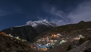 Spectacular Namche Bazaar lit up at night, in the Everest region, Himalayas, Nepal, Asia