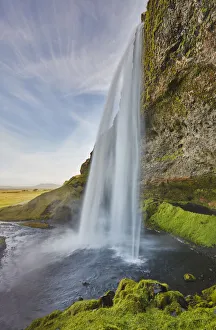 A spectacular sheer waterfall, Seljalandsfoss Falls, near Vik