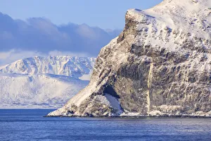 Arctic Circle Prints: Spectacular snow covered mountains in winter, Troms islands, from the Norwegian Sea